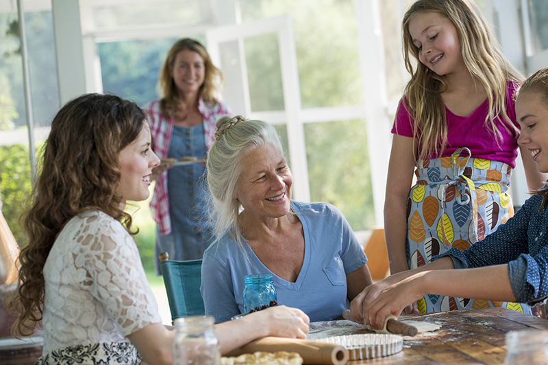 Women come together to participate in an intergenerational program for seniors.
