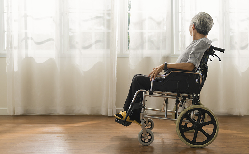 An older adult finds comfortable clothes that adapt to their wheelchair use.