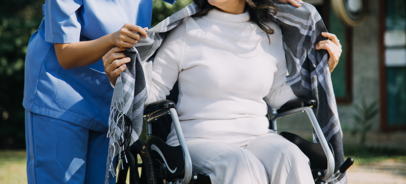 A woman finds comfortable, stylish clothes for women in wheelchairs.