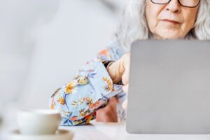 benefits of lifelong learning. senior woman at computer