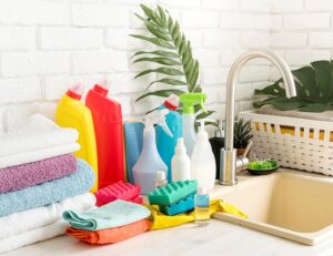 Spring Cleaning Tips for Seniors. Cleaning supplies on counter.