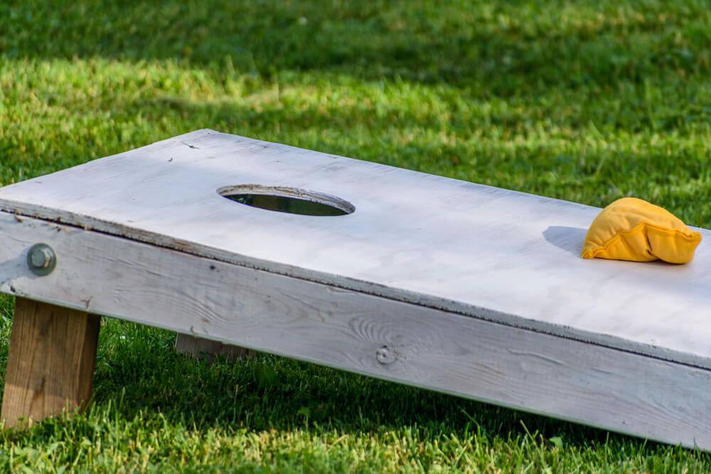 Cornhole is one of the many fun outdoor games for seniors.