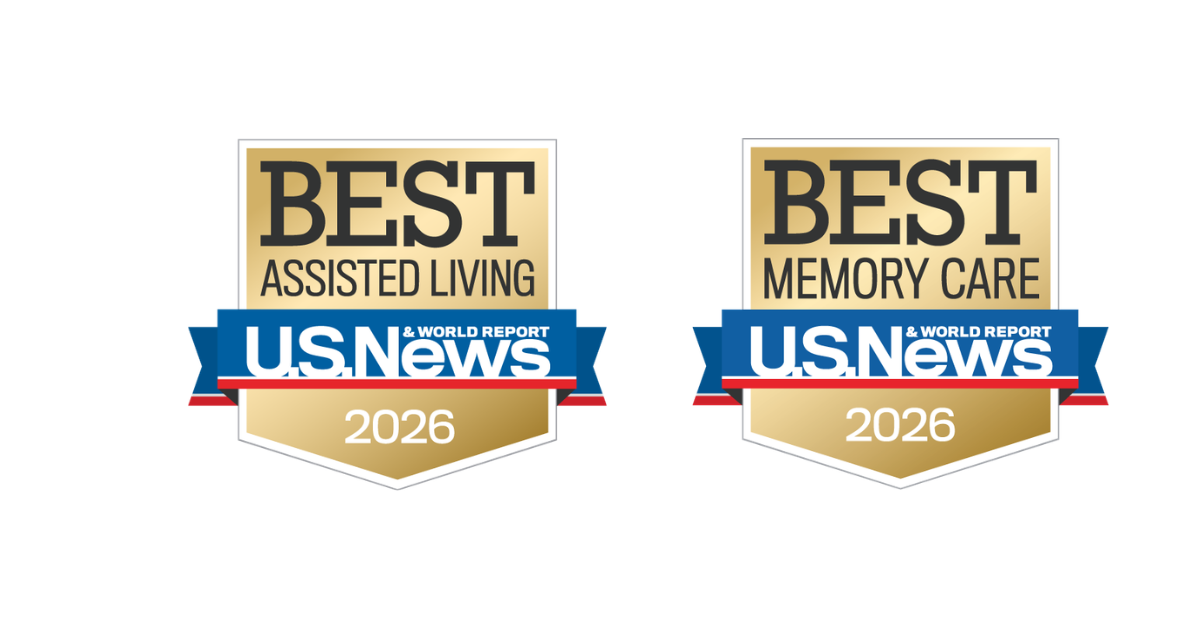 Two gold badges from U.S. News & World Report for 2026, labeled "Best Assisted Living" and "Best Memory Care," highlight AlmaVia of Camarillo as a recipient of Best Senior Living awards against a white background.