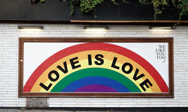 Love is love rainbow sign. LGBTQ seniors.
