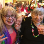 two seniors party at the elder care summer solstice celebration